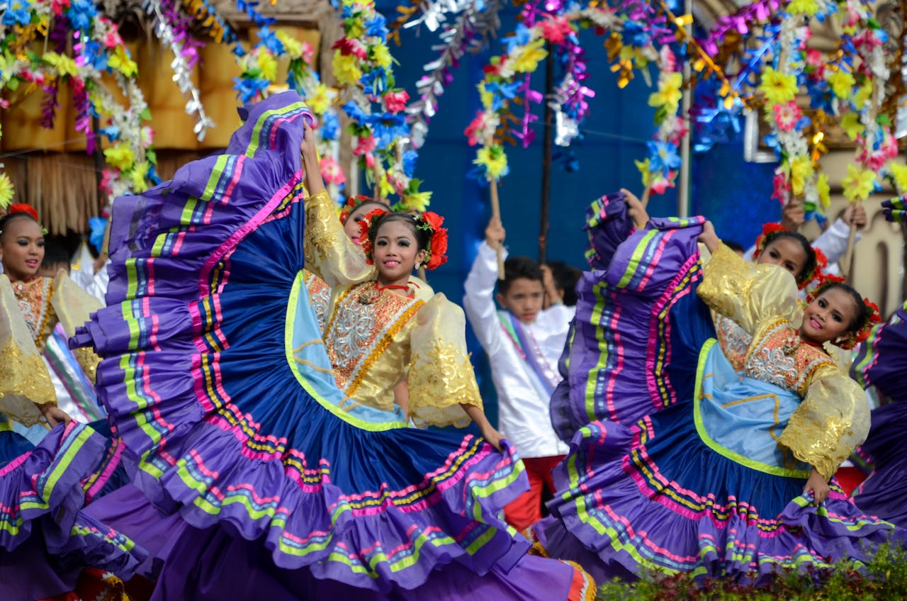 Home Captivating dancers in traditional attire performing at Cebu City Sinulog Festival, Philippines.